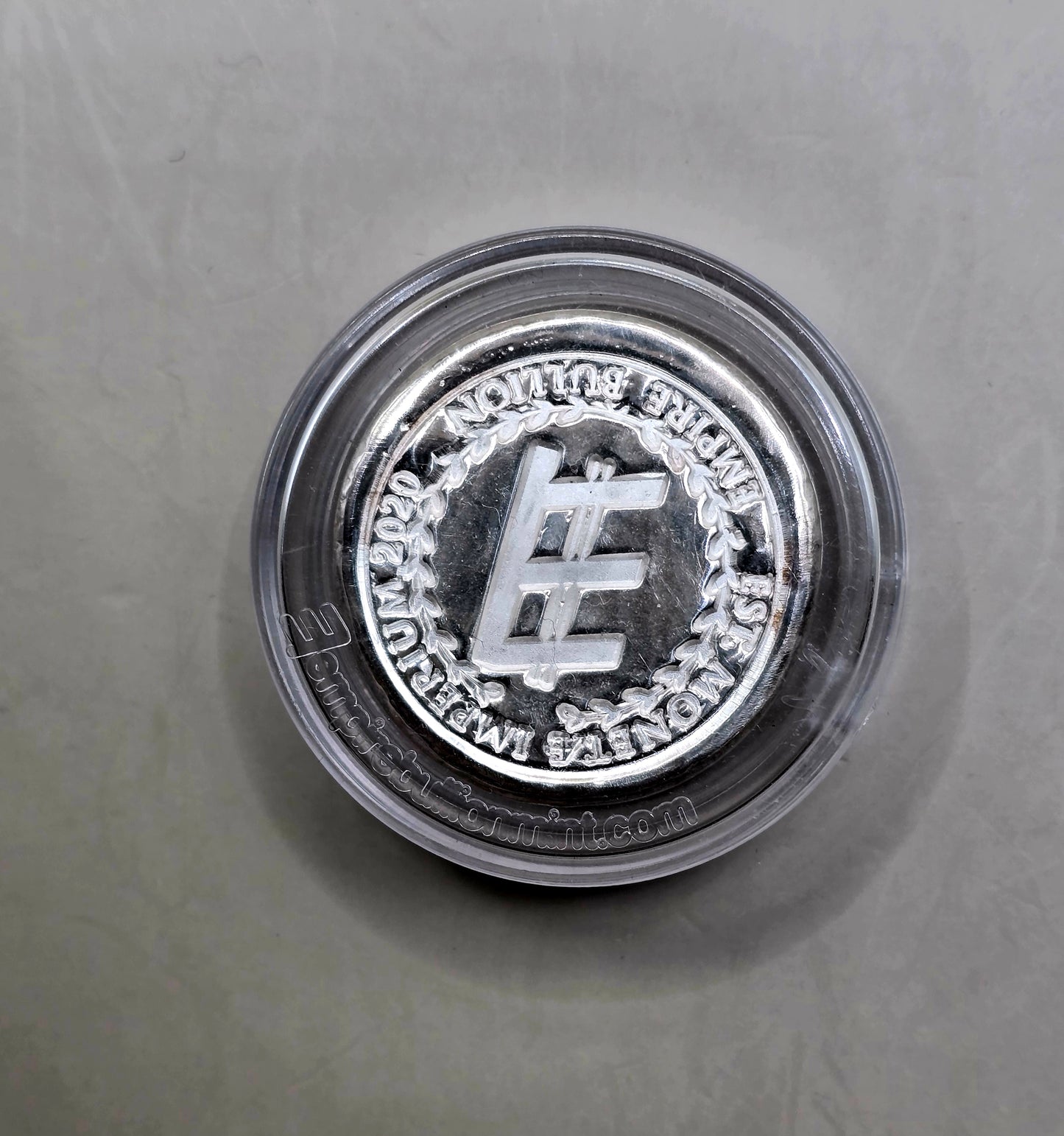1oz Empire silver round (random)