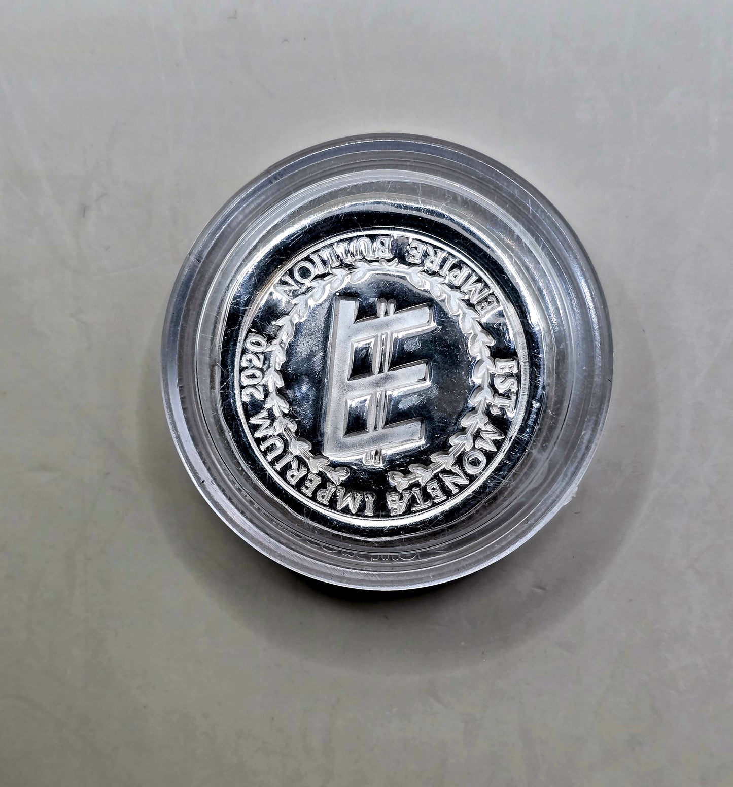 1oz Empire silver round (random)