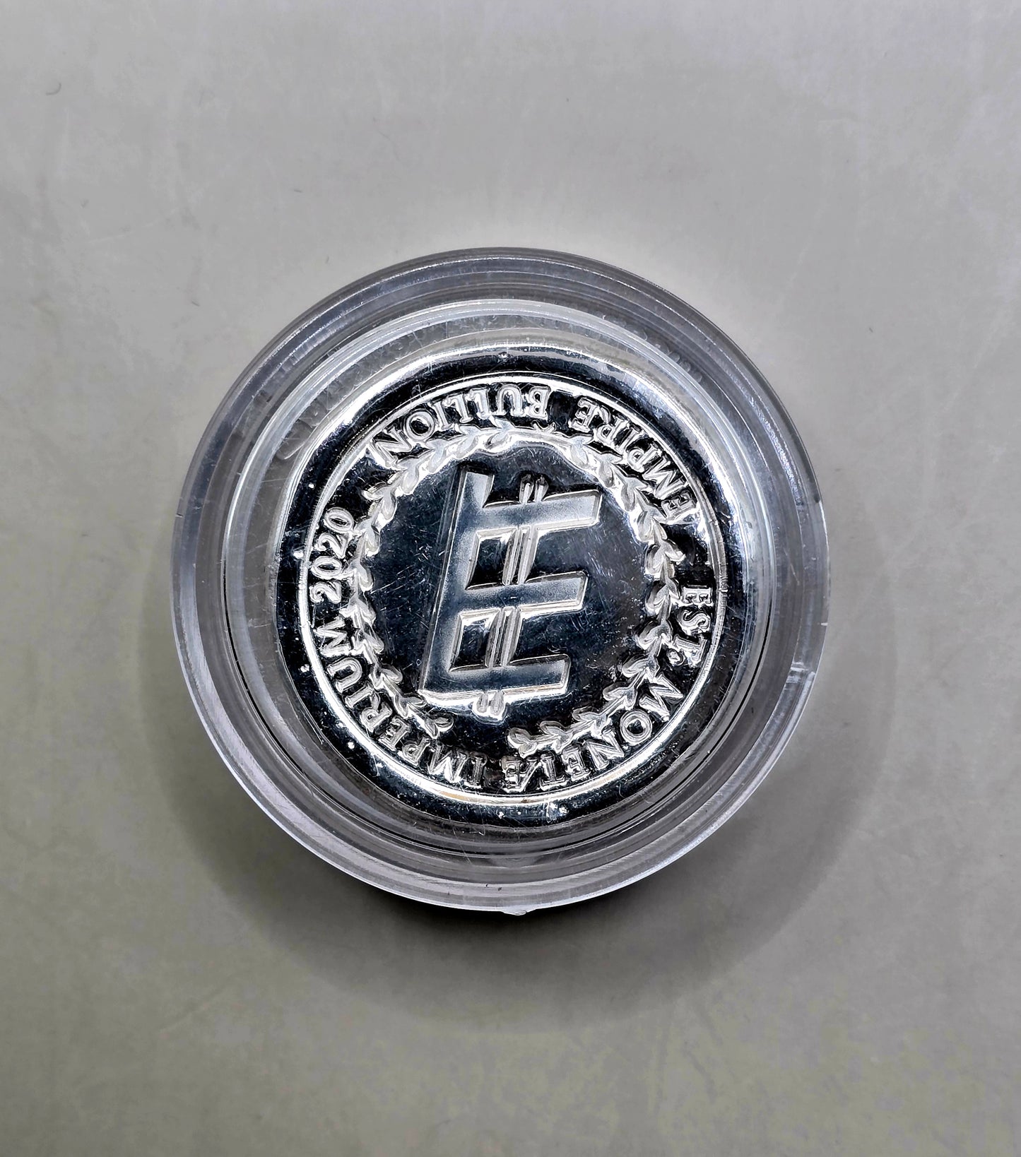 1oz Empire silver round (random)