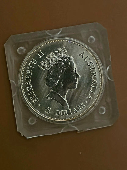1oz 1990 silver Kookaburra (edges toned)